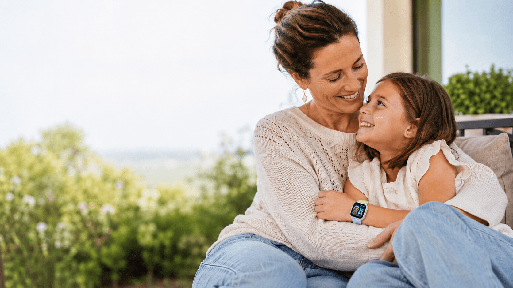 Mother and daughter smiling together outdoors, showing the warmth of Mother’s Day and everyday family connection